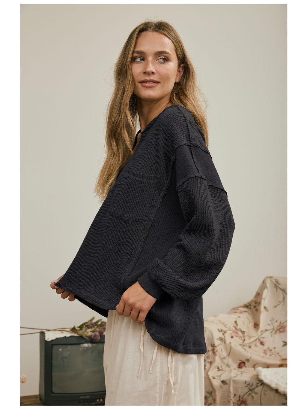Split Neck Raw Edge Long Sleeve Ribbed Knit Top